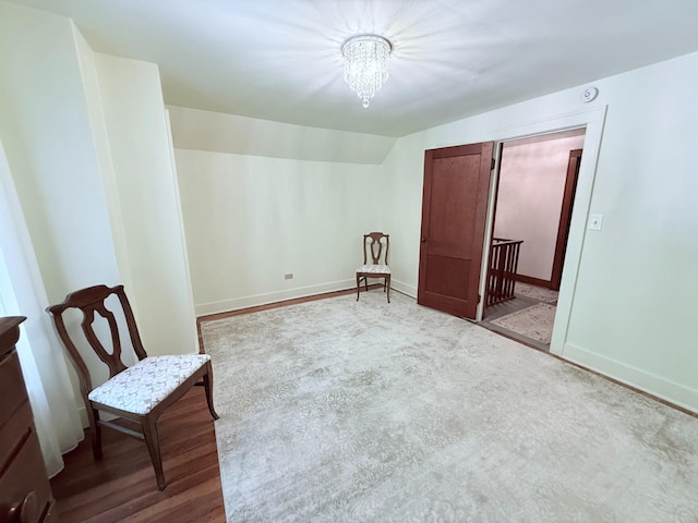 3628 Rau Rd, West Branch, MI 48661 - living area with lofted ceiling and a chandelier