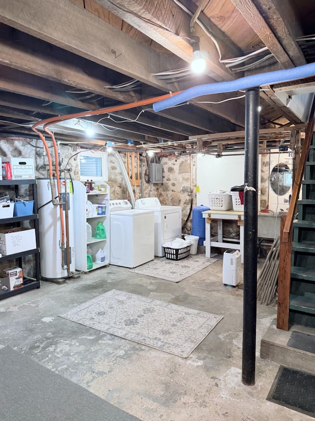 3628 Rau Rd, West Branch, MI 48661 - unfinished below grade area featuring electric water heater, separate washer and dryer, stairs, and a water pressure tank