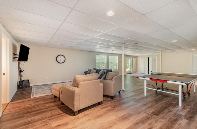 118 Frisco Dr, Houghton Lake, MI 48629 - living room with a paneled ceiling, wood finished floors, and recessed lighting
