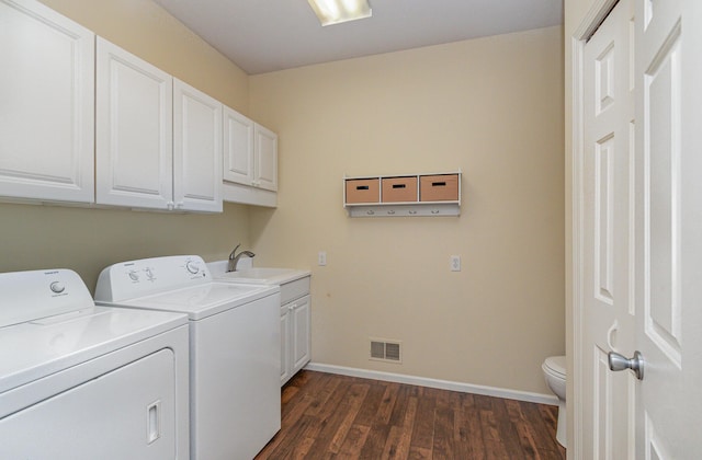 118 Frisco Dr, Houghton Lake, MI 48629 - laundry room featuring washing machine and clothes dryer and dark wood-style flooring