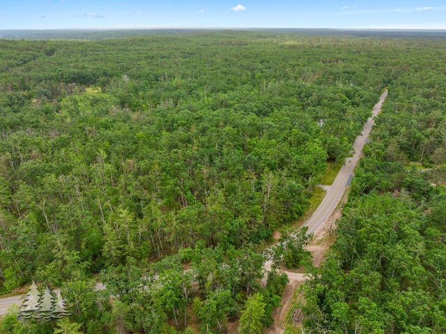2801 Cobb Rd, Lewiston, MI 49756 - aerial view of property and surrounding area featuring a heavily wooded area