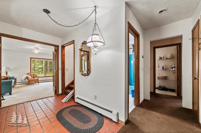 2801 Cobb Rd, Lewiston, MI 49756 - corridor featuring a baseboard heating unit, carpet floors, a textured ceiling, and tile patterned flooring