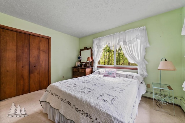 2801 Cobb Rd, Lewiston, MI 49756 - carpeted bedroom featuring a closet and a textured ceiling