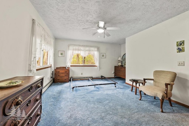 2801 Cobb Rd, Lewiston, MI 49756 - sitting room with baseboard heating, ceiling fan, carpet, a textured ceiling, and a baseboard heating unit