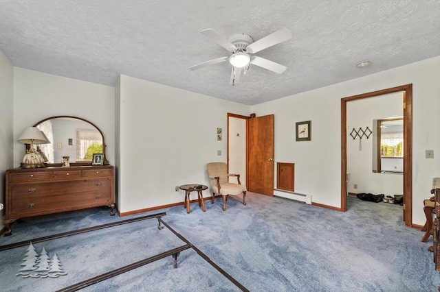 2801 Cobb Rd, Lewiston, MI 49756 - carpeted bedroom with a baseboard radiator, a textured ceiling, and ceiling fan
