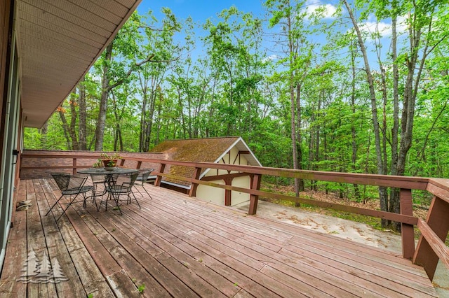 2801 Cobb Rd, Lewiston, MI 49756 - wooden deck with outdoor dining area