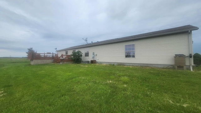 15135 M-32, Lachine, MI 49753 - rear view of property with a deck and a yard