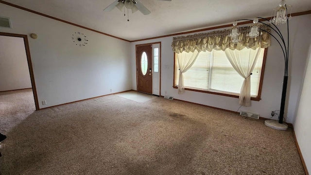 15135 M-32, Lachine, MI 49753 - entryway with light carpet, ornamental molding, and a ceiling fan
