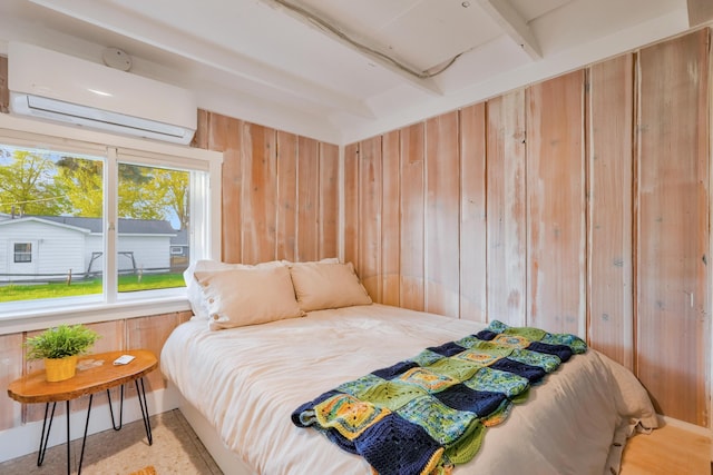 6390 W Houghton Lake Dr, Houghton Lake, MI 48629 - bedroom featuring a wall mounted air conditioner and wooden walls
