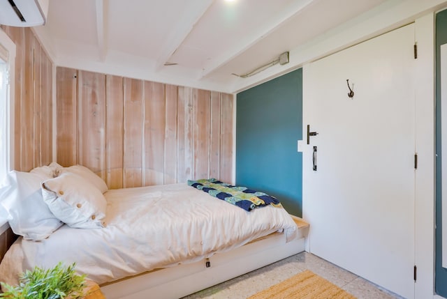 6390 W Houghton Lake Dr, Houghton Lake, MI 48629 - bedroom featuring wooden walls and a wall unit AC