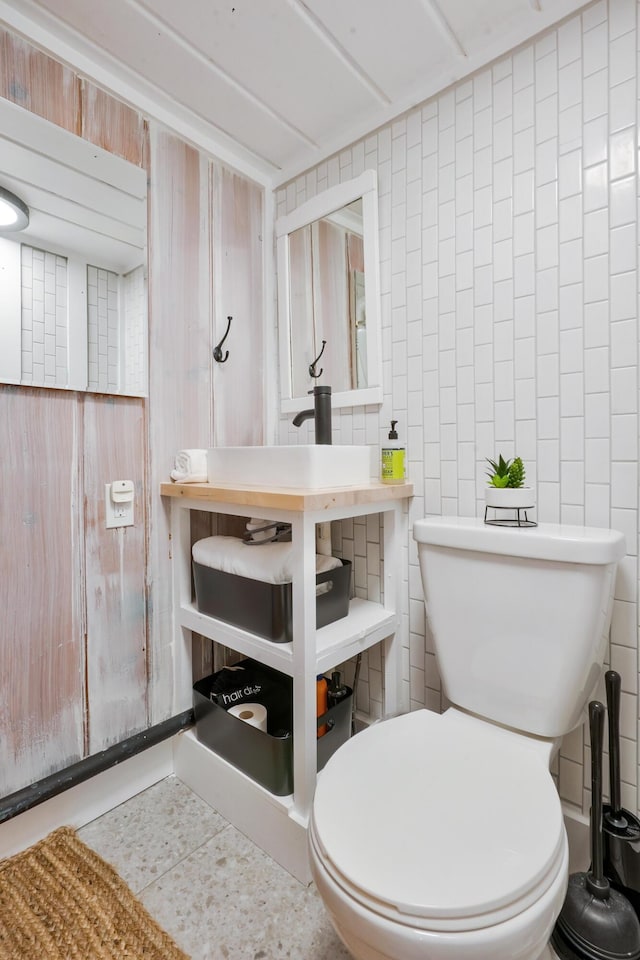 6390 W Houghton Lake Dr, Houghton Lake, MI 48629 - half bathroom featuring toilet