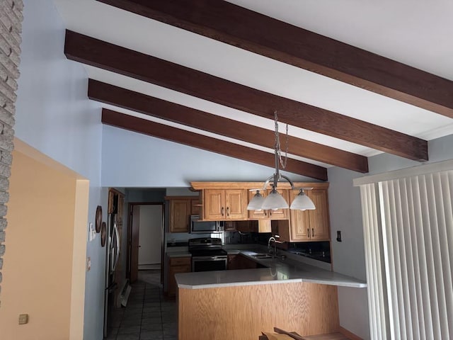3011 Piper Rd, Alpena, MI 49707 - kitchen featuring appliances with stainless steel finishes, a peninsula, dark tile patterned flooring, and decorative light fixtures