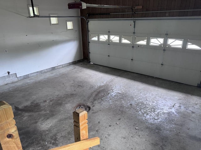 3011 Piper Rd, Alpena, MI 49707 - garage with a garage door opener