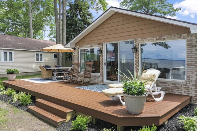 802 Houghton View Dr, Prudenville, MI 48651 - deck with outdoor dining area