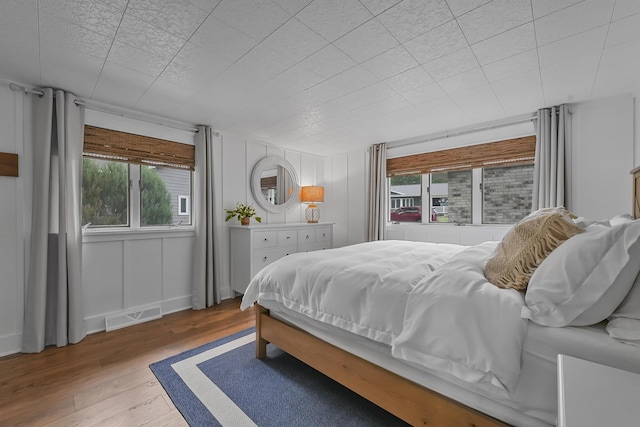 802 Houghton View Dr, Prudenville, MI 48651 - bedroom with wood finished floors