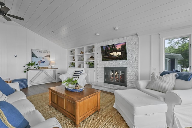 802 Houghton View Dr, Prudenville, MI 48651 - living room with wooden ceiling, wood finished floors, lofted ceiling, a fireplace, and a ceiling fan