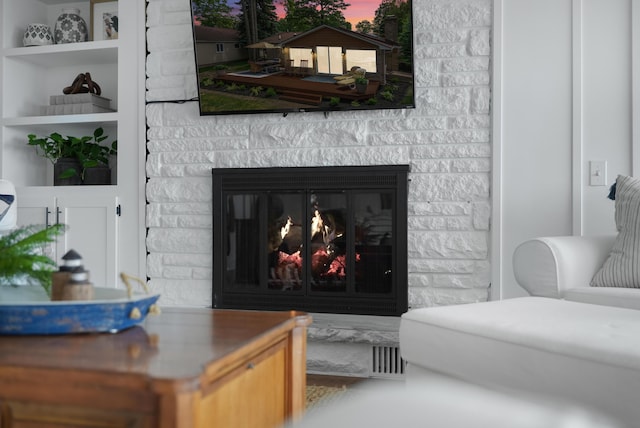 802 Houghton View Dr, Prudenville, MI 48651 - living area featuring a glass covered fireplace
