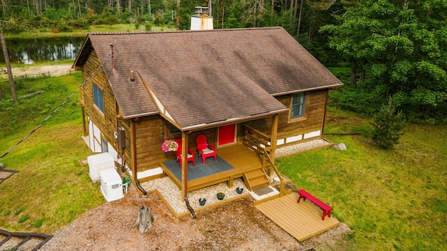 6612 Old Vanderbilt Rd, Vanderbilt, MI 49795 - view of subject property featuring a large body of water and a forest