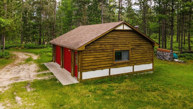 6612 Old Vanderbilt Rd, Vanderbilt, MI 49795 - view of outbuilding featuring a forest view and driveway