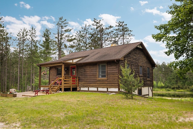 6612 Old Vanderbilt Rd, Vanderbilt, MI 49795 - rustic home featuring a front lawn and a chimney