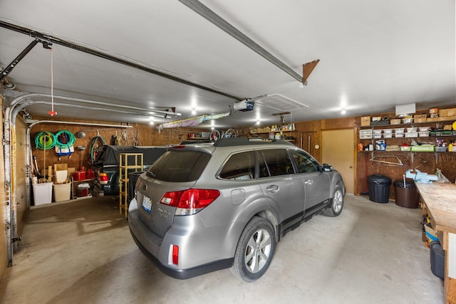 6612 Old Vanderbilt Rd, Vanderbilt, MI 49795 - garage with a garage door opener