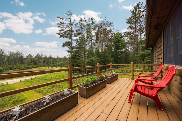 6612 Old Vanderbilt Rd, Vanderbilt, MI 49795 - view of wooden deck