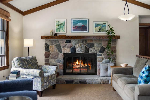 6612 Old Vanderbilt Rd, Vanderbilt, MI 49795 - living area with vaulted ceiling, carpet, a fireplace, and plenty of natural light