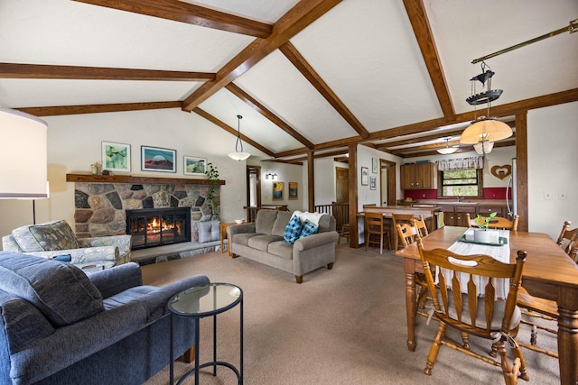 6612 Old Vanderbilt Rd, Vanderbilt, MI 49795 - living area featuring carpet and a stone fireplace