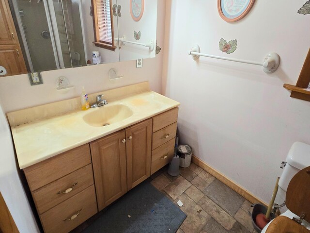 2880 Ann Arbor Rd, Lewiston, MI 49756 - full bathroom with vanity, stone tile flooring, and a shower stall