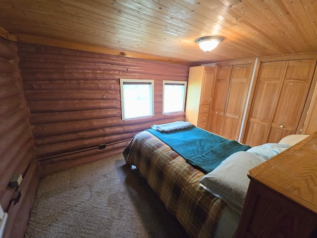 2880 Ann Arbor Rd, Lewiston, MI 49756 - carpeted bedroom featuring rustic walls, wood ceiling, and multiple closets