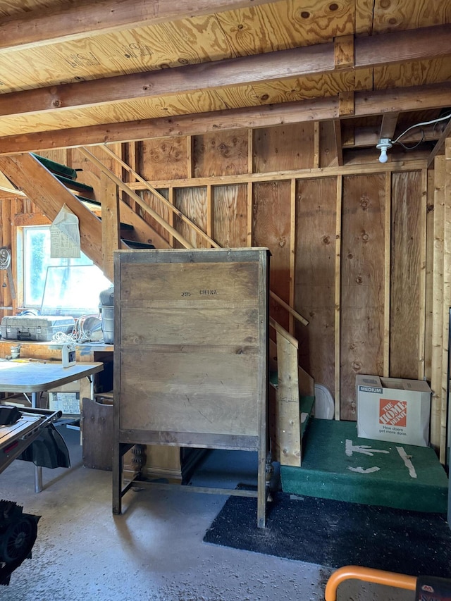 2493 S Horseshoe Trl, Grayling, MI 49738 - miscellaneous room with concrete flooring and wood walls