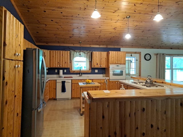 4160 S Vaughn Lake Rd, Glennie, MI 48737 - kitchen featuring white appliances, lofted ceiling, wood ceiling, hanging light fixtures, and light flooring