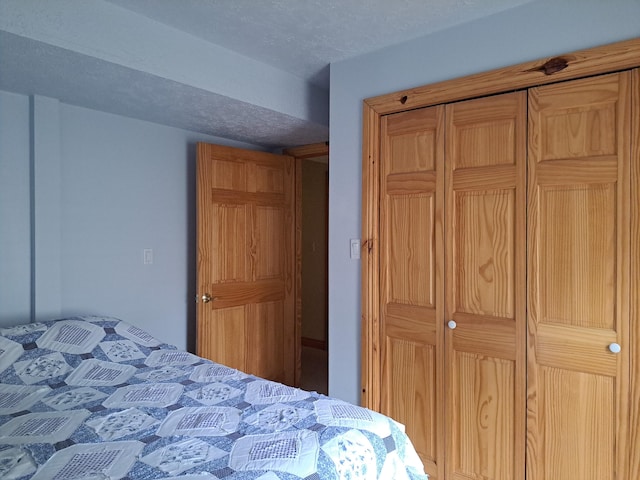 4160 S Vaughn Lake Rd, Glennie, MI 48737 - bedroom featuring a closet
