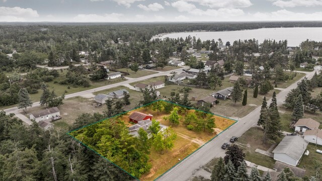 2731 Gregory St, Lewiston, MI 49756 - aerial view of property's location with a large body of water and property boundaries highlighted