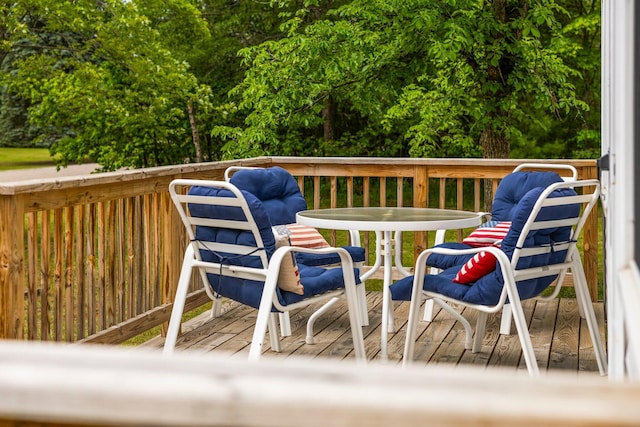 2731 Gregory St, Lewiston, MI 49756 - deck featuring outdoor dining area