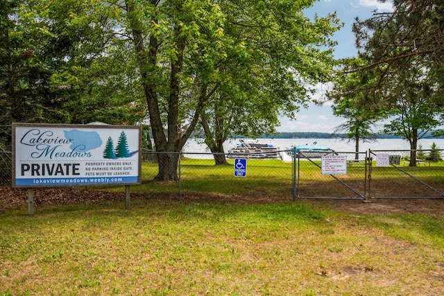 2731 Gregory St, Lewiston, MI 49756 - view of community with a water view and a gate