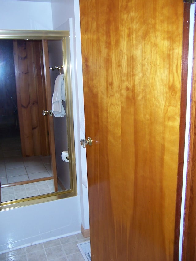 409 Marvin Rd, Roscommon, MI 48653 - bathroom with tile patterned floors