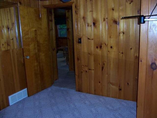 409 Marvin Rd, Roscommon, MI 48653 - hall with carpet and wood walls
