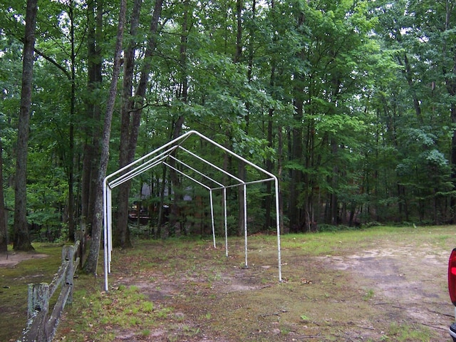 409 Marvin Rd, Roscommon, MI 48653 - view of yard featuring a view of trees