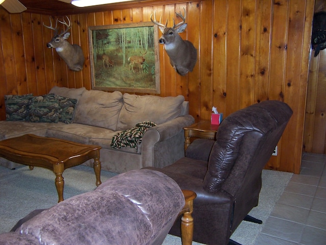 409 Marvin Rd, Roscommon, MI 48653 - tiled living room with wooden walls