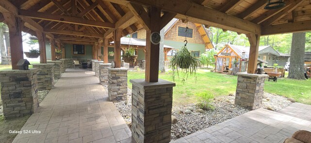 1161 Lagoon St, Lewiston, MI 49756 - view of patio / terrace with a gazebo