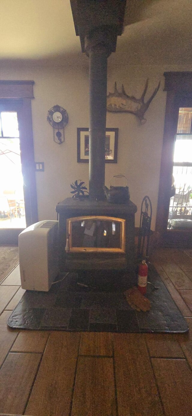 1161 Lagoon St, Lewiston, MI 49756 - detailed view of a wood stove