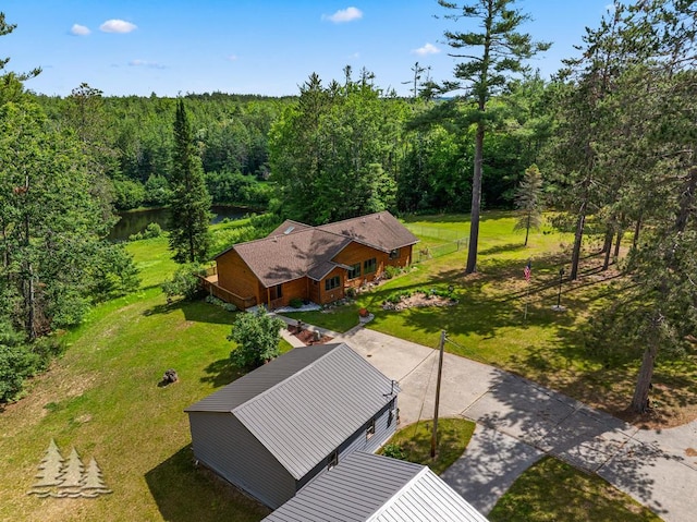 881 N Red Oak Rd, Lewiston, MI 49756 - view of subject property with a heavily wooded area and a large body of water