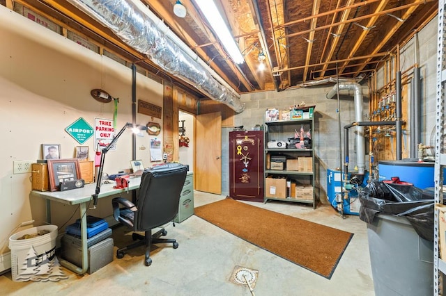 881 N Red Oak Rd, Lewiston, MI 49756 - unfinished below grade area featuring a desk