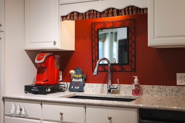 881 N Red Oak Rd, Lewiston, MI 49756 - kitchen featuring dishwasher, light countertops, and white cabinets
