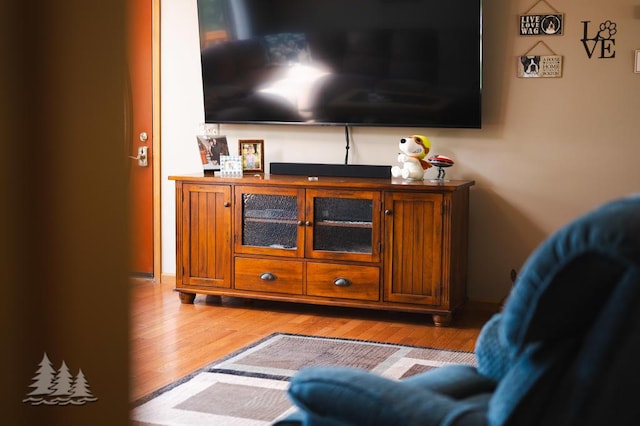 881 N Red Oak Rd, Lewiston, MI 49756 - living room with light wood-style floors
