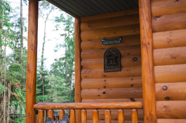 881 N Red Oak Rd, Lewiston, MI 49756 - exterior view of log veneer siding