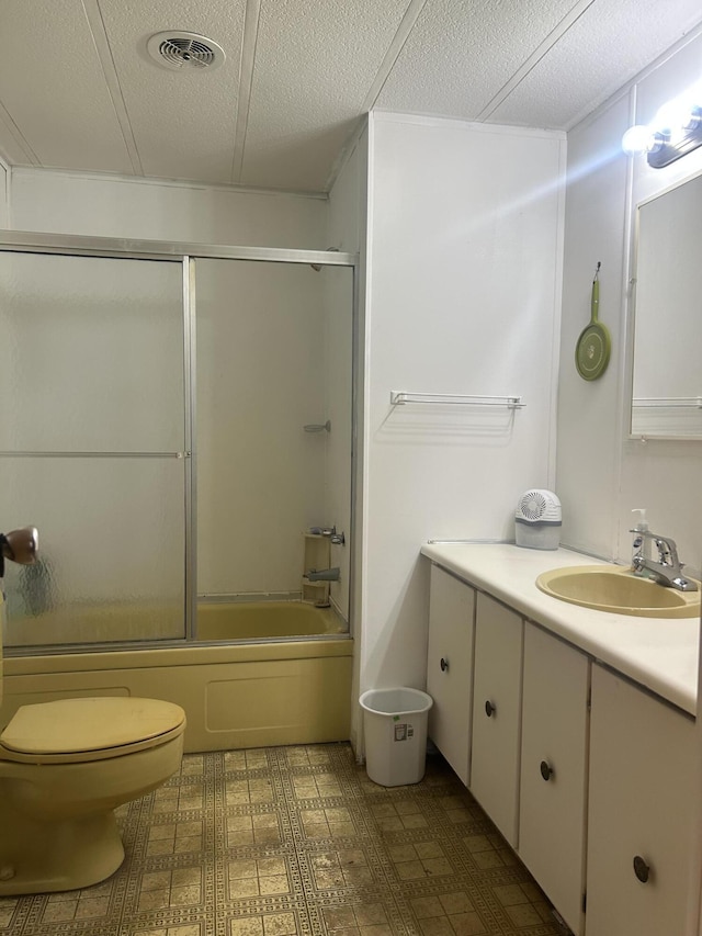15939 Hiawatha Trl, Atlanta, MI 49709 - bathroom featuring vanity and shower / bath combination with glass door