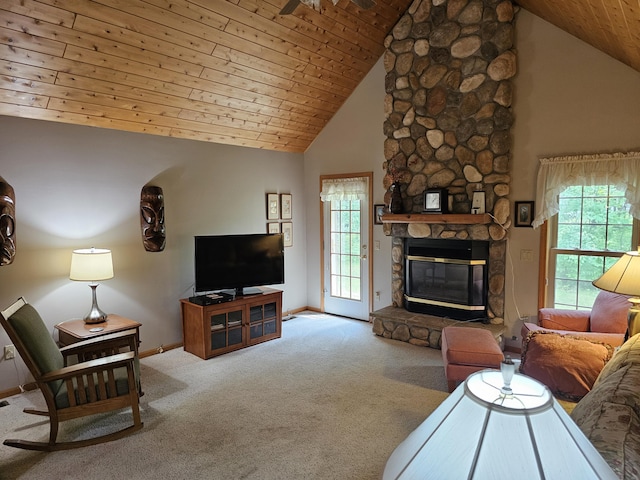 14911 Kings Ln, Ocqueoc, MI 49759 - carpeted living room featuring plenty of natural light, high vaulted ceiling, wood ceiling, and a stone fireplace