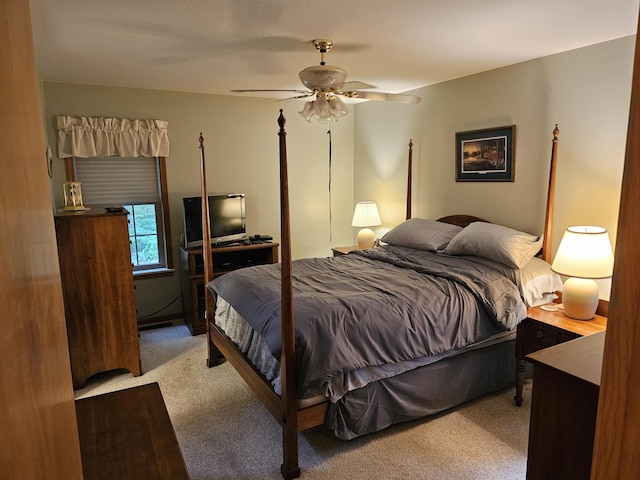 14911 Kings Ln, Ocqueoc, MI 49759 - bedroom featuring light carpet and ceiling fan